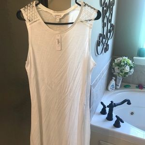 White sleeveless dress with lace shoulder detail